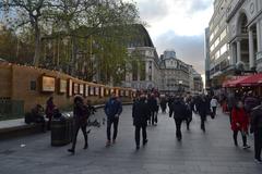 Leicester Square with people walking