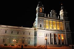 Plaza Mayor in Madrid with surrounding historic buildings and Christmas lights