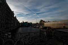 scenic view of Damrak street from Prins Hendrikkade in Amsterdam