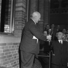 Trophy presentation to the Koopmansbeurs football team in Amsterdam, 1945