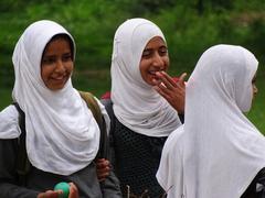 Muslim girls in traditional attire at Shalimar Bagh Garden, Srinagar