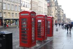 trio of Telephone boxes on The Royal Mile