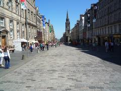 High Street, Edinburgh in Scotland during daytime with pedestrians and historic buildings