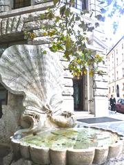 Italian cultural heritage monument with shell and bee engravings