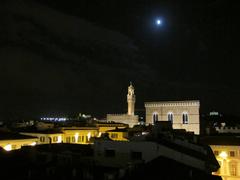 Night view of Orsanmichele and Palazzo Vecchio from Hotel Medici terrace