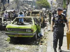 Destruction in front of Paddy's Pub and Sari Club after Bali Bombing on 12 October 2002