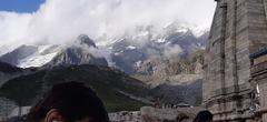 Kedarnath Temple with snow hills in the background