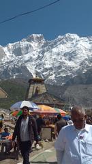 Kedarnath Temple with snow-capped mountains in the background