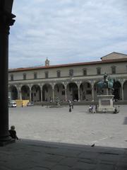 Piazza Santissima Annunziata in Florence with historical buildings and statue