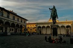 Piazza della Santissima Annunziata in Florence with view of Il Loggiato della Confraternita dei Servi di Maria, Santissima Annunziata Basilica, and Equestrian Statue of Grand Duke Ferdinando I de Medici