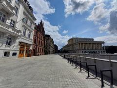 Wrocław Pl. Wolności with Max Born Forum, churches, Hotel Monopol, and National Forum of Music parking entrance