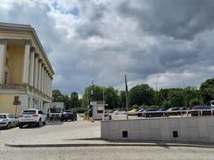 Wrocław pl. Wolności with Opera and parking on the left, entrance to National Forum of Music parking in the foreground