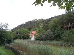 Märchenteich pond with castle ruins in Mödling, Austria