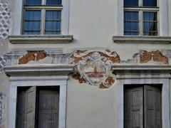 Piazza Battisti Rovereto with frescoes on the corner house at Vicolo del Messaggero