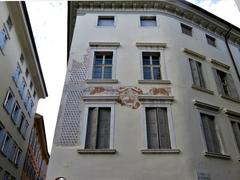 Piazza Battisti Rovereto with frescoes on the corner house