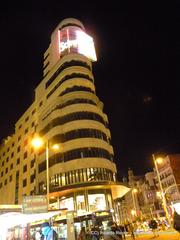 Edificio Carrión Hotel Capitol at night with illuminated lights in Madrid