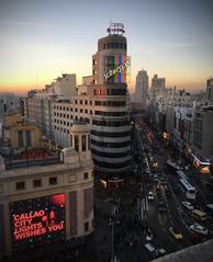 Capitol building at Plaza del Callao and Gran Vía, Madrid, during sunset