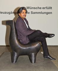 Indian designer Satyendra Pakhalé explaining Bell Metal Horse Chair sculpture in Museum of Applied Art Cologne