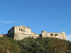 Fort Carré in Antibes overlooking a small green area and the sea