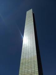 Sun shining over a reflective water surface