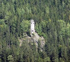 Christusstatue in Les Houches with snowy mountains in the background