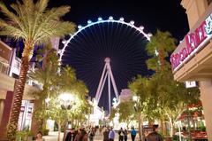 High Roller Ferris wheel lit up at night in Las Vegas