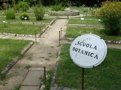 Orto botanico di Pisa plants with 'SCUOLA BOTANICA' sign