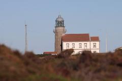 West facade of Faro de Cabo Peñas with clear sky