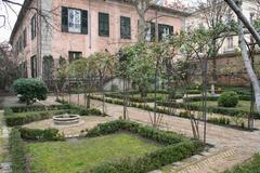 Jardines del Principe de Anglona garden with trees, pathways, and traditional Spanish landscaping