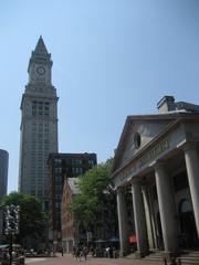 Quincy Market in Boston, Massachusetts on a sunny day with people walking