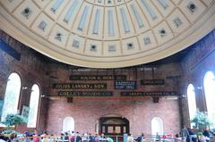 Dome inside Quincy Market in Boston with old business names on the wall