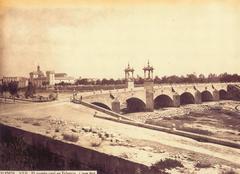 Pont del Real de Valencia 1870 by Jean Laurent Minier with Sant Pius V in the background and remnants of the wall in the foreground.