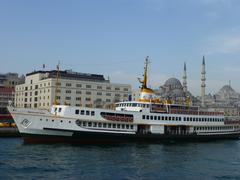 Ships on the Bosphorus Strait in Istanbul under a blue sky