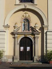 Baroque entrance portal of the monastery church in Rudy Wielkie