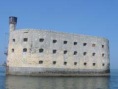 Fort Boyard in the sea under a cloudy sky