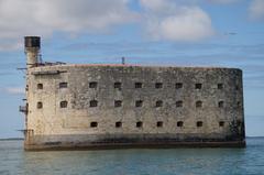 Fort Boyard in calm waters under a clear sky