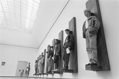 Visitors at the Stedelijk Museum in Amsterdam forming a wall at the 'Lovers' exhibition, June 27, 1989