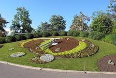 Flower clock in Ginevra with lush greenery