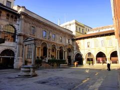 scenic view of Milan cityscape with historic buildings and green spaces