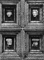 decorative heads on the ceiling of the Wawel Castle in Krakow