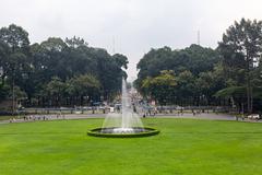 A fountain in front of Independence Palace