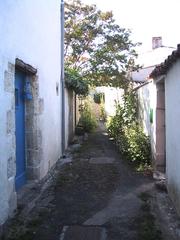 Typical narrow street in Mornac-sur-Seudre, France