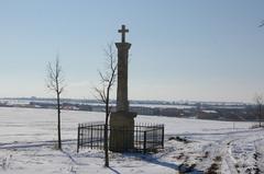 view of Nový Jenštejn from the north with a cross between Jenštejn and Dřevčice