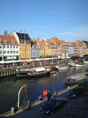 Nyhavn canal with colorful buildings and boats in Copenhagen