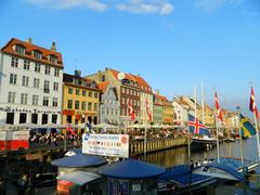 scenic view of Copenhagen waterfront with historic buildings and boats