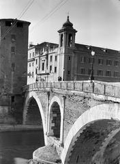 Buildings in Trastevere with the bridge over the Tiber seen from the opposite bank, December 1937