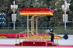 final preparations on the Chinese presidential dais before the official arrival ceremony of President Jair Bolsonaro