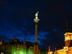 Zygmunt's Column illuminated at night in Warsaw, Poland