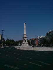 Panoramic view of Lisboa with a river in the background