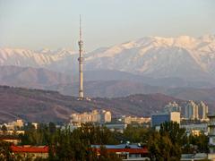 TV Tower in Almaty with mountains in the background